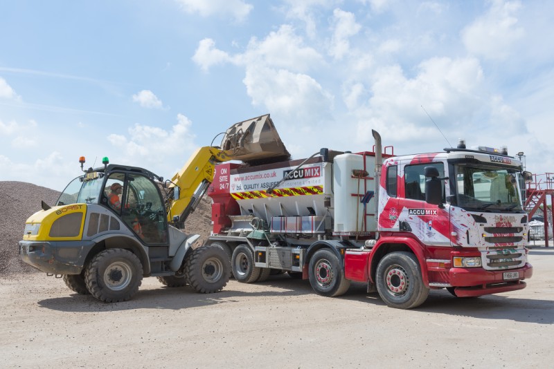 Yellow cement mixing lorry